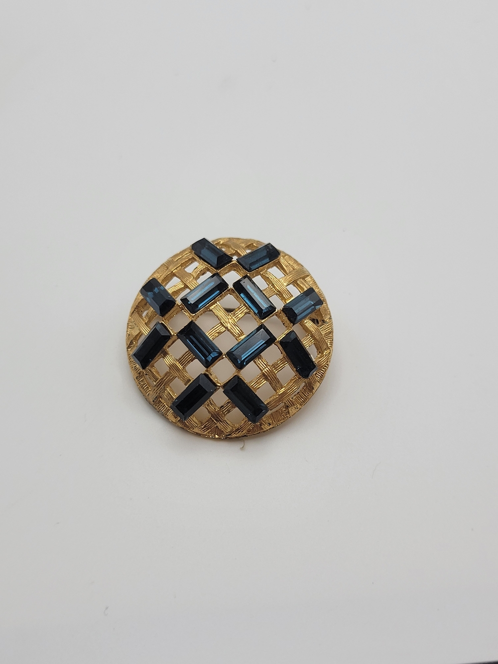 Gold Tone Brooch with Navy Blue Crystal Accents